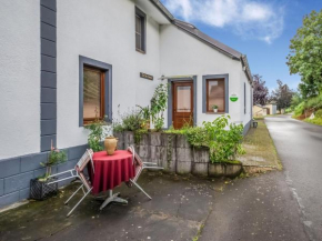 Modern holiday home in the Eifel next to an old farmhouse